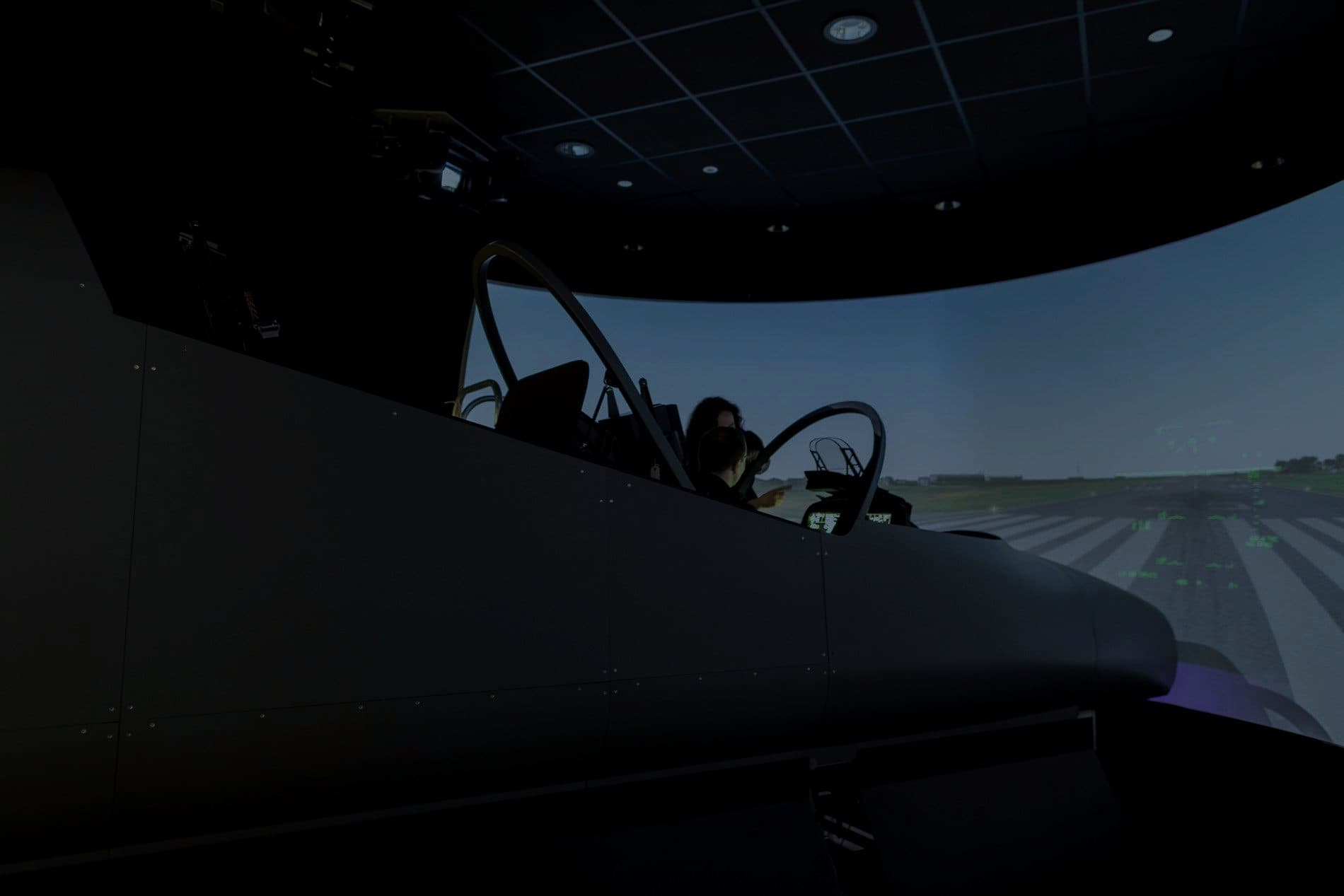 Engineers inside a full-dome flight simulator