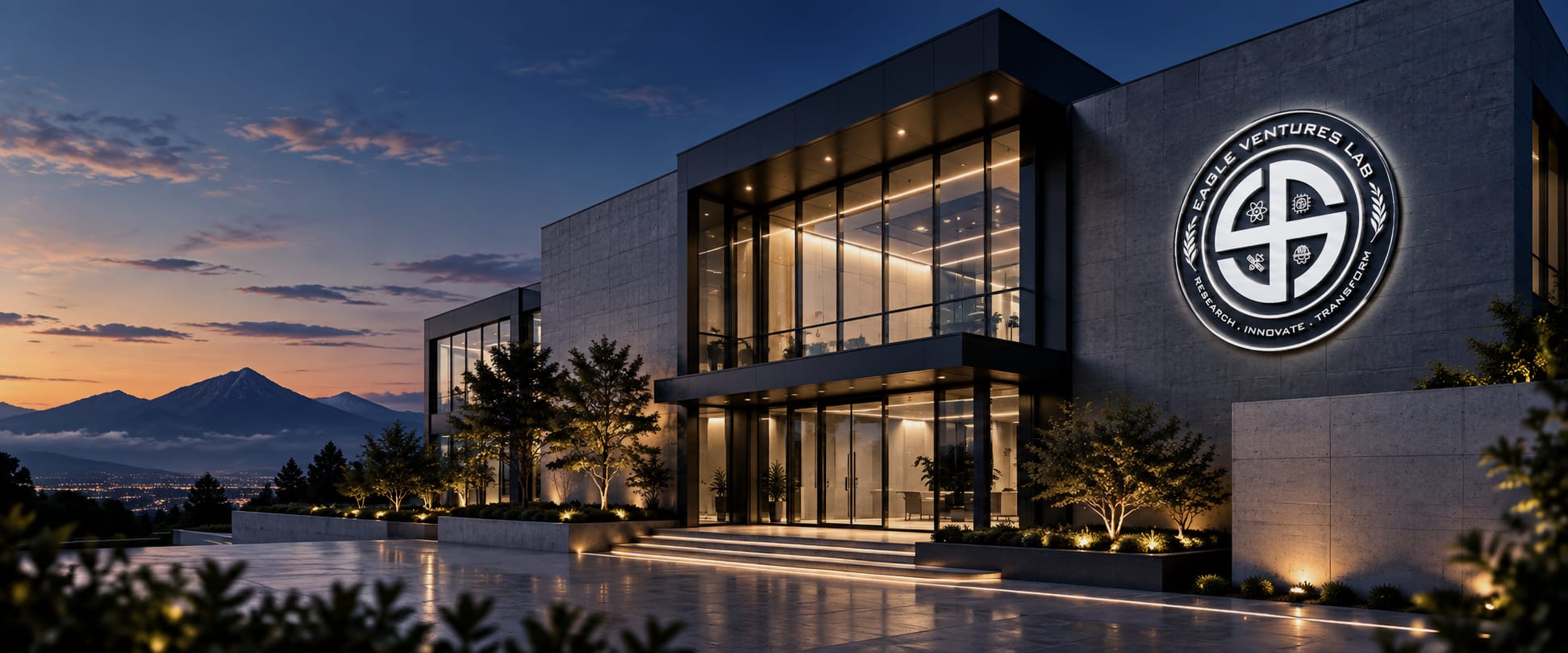 The Eagle Ventures Lab headquarters at dusk, with the lab's seal lit on the facade