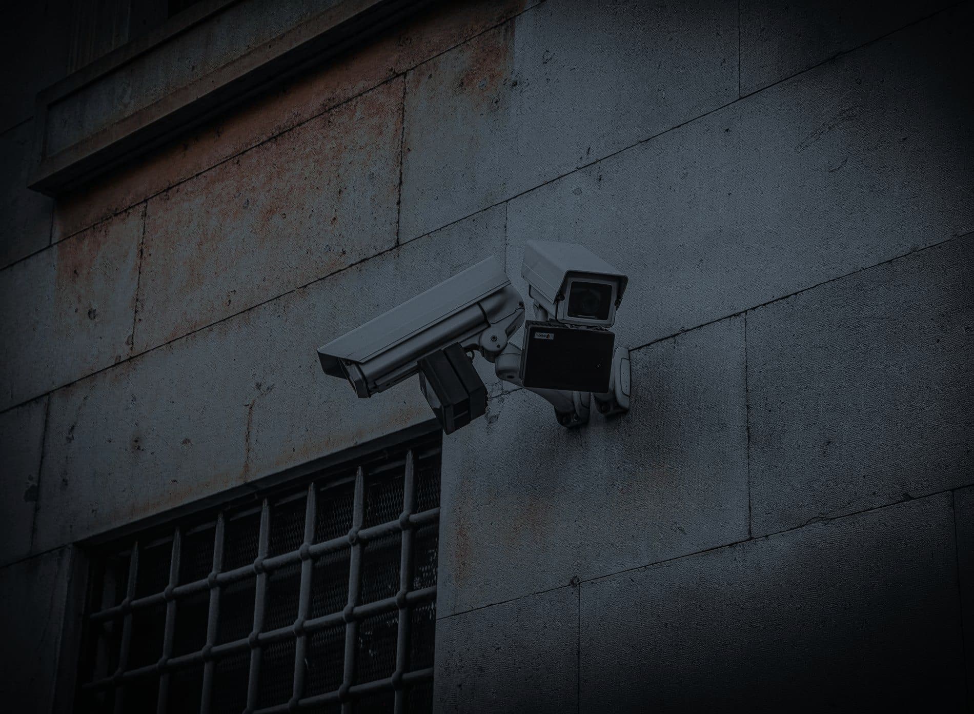 Security cameras mounted on a building wall
